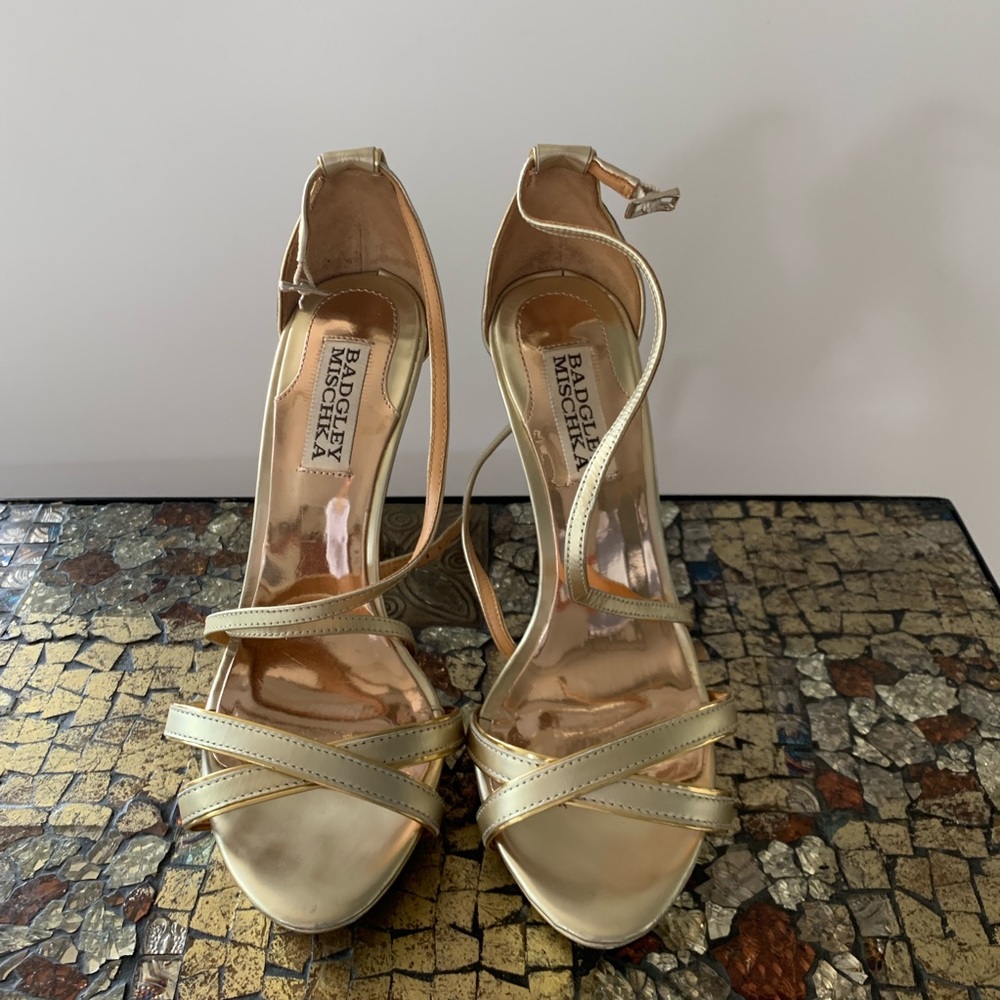 Badgley Mischka gold strappy heels.